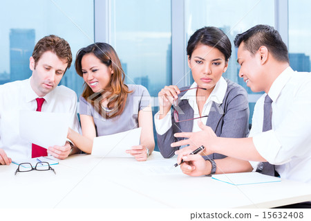 Asian Business Team in Strategy meeting 15632408