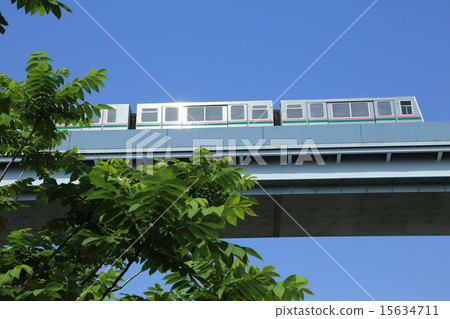 Nippori Temple liner and blue sky passing through Fan Bridge over Arakawa 15634711
