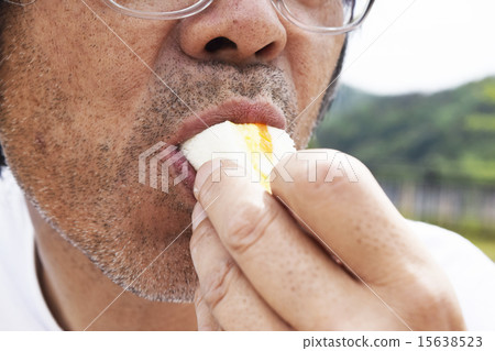 A man eating A man eating 15638523