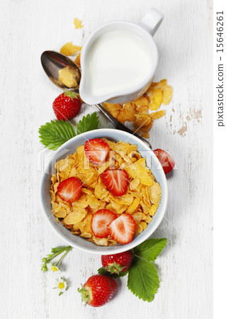 Breakfast with corn flakes, milk and strawberry Breakfast with corn flakes, milk and strawberry 15646261