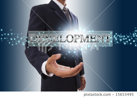 Businessman hand showing development button Businessman hand showing development button 15653495