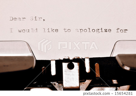 Text Dear Sir typed on old typewriter 15654281
