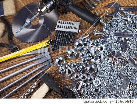 Set of different tools on wooden background Set of different tools on wooden background 15660616