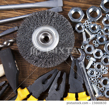 Set of different tools on wooden background Set of different tools on wooden background 15660630
