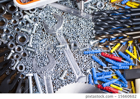 Assorted work tools on wood background Assorted work tools on wood background 15660682