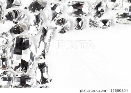 Large crystal strasses on a white background 15660894