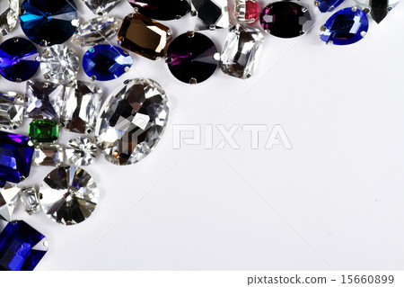 Large crystal strasses on a white background 15660899