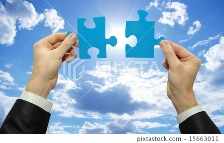 puzzle in hands puzzle in hands 15663011