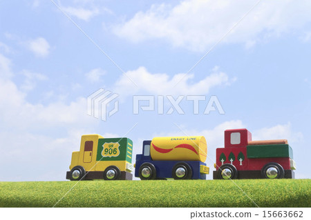Three toys of blue sky and tree car tracks landscape 15663662
