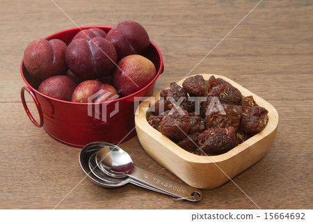 Fresh and dried plums 15664692