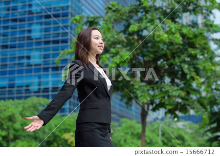 Chinese businesswoman with open arms Chinese businesswoman with open arms 15666712