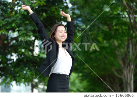 Successful Chinese businesswoman raise arms 15666866