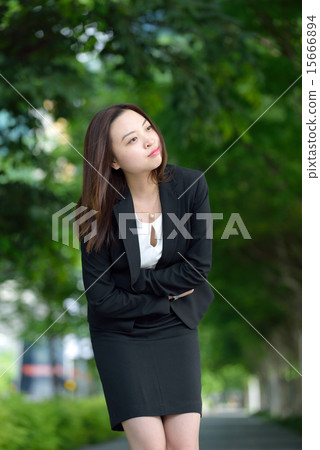 Chinese businesswoman having stomachache Chinese businesswoman having stomachache 15666894