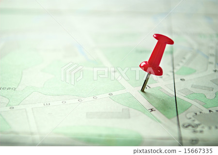 Close up Red Pin Marking on a Green White Map 15667335