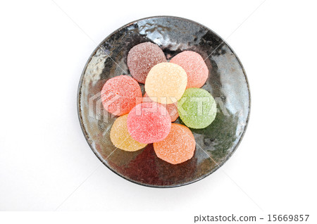 Colorful jelly candy's sweets on dish White background 15669857