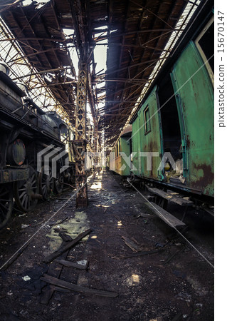Old trains at abandoned train depot 15670147