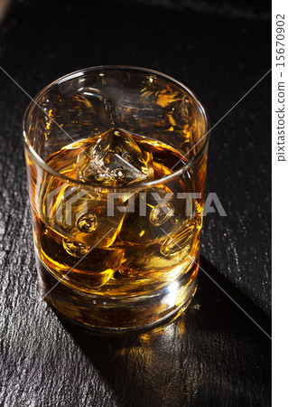 Glass of scotch whiskey with ice Glass of scotch whiskey with ice 15670902