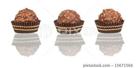 chocolate candy in tartlet form on white chocolate candy in tartlet form on white 15671568