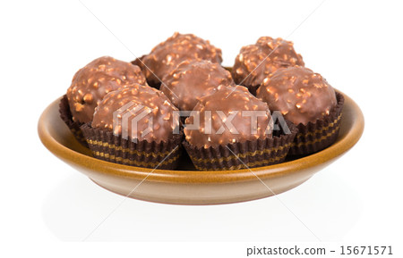 chocolate candy in tartlet form on white 15671571