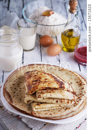 Stack of crepes and ingredients for cooking Stack of crepes and ingredients for cooking 15671828