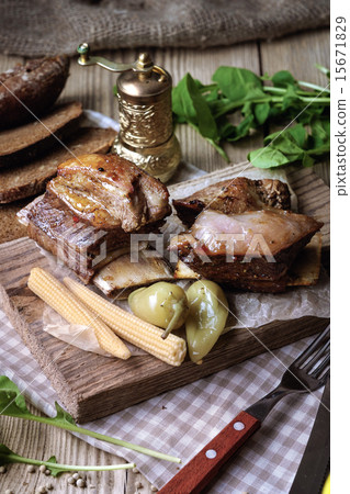 Baked spare ribs with herbs and spices Baked spare ribs with herbs and spices 15671829