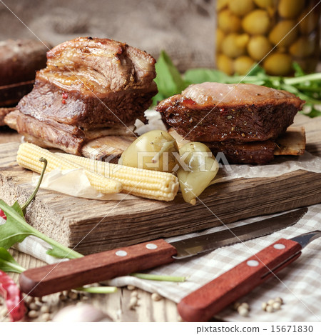 Baked spare ribs with herbs and spices Baked spare ribs with herbs and spices 15671830