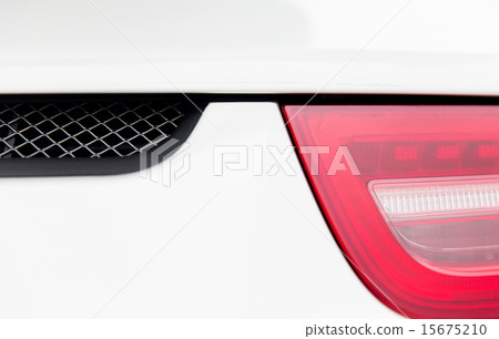 close up of car part with grille and headlight 15675210