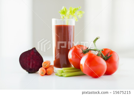 close up of fresh juice and vegetables on table close up of fresh juice and vegetables on table 15675215