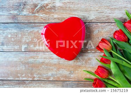 close up of red tulips and chocolate box close up of red tulips and chocolate box 15675219