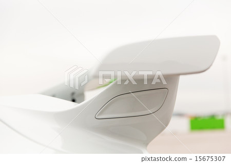 close up of car spoiler on speedway at stadium 15675307