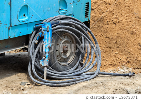 Old handheld hydraulic hammer 15675371