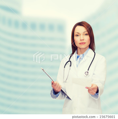 calm female doctor with clipboard calm female doctor with clipboard 15675601