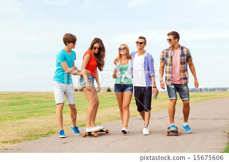 group of smiling teenagers with skateboards group of smiling teenagers with skateboards 15675606