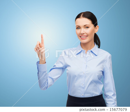 businesswoman touching something imaginary businesswoman touching something imaginary 15677079