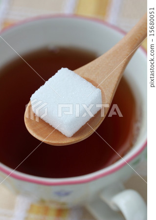 Cube sugar and tea 15680051