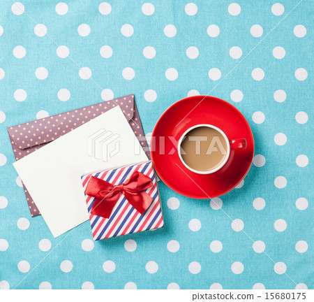 Cup of coffee and envelope 15680175