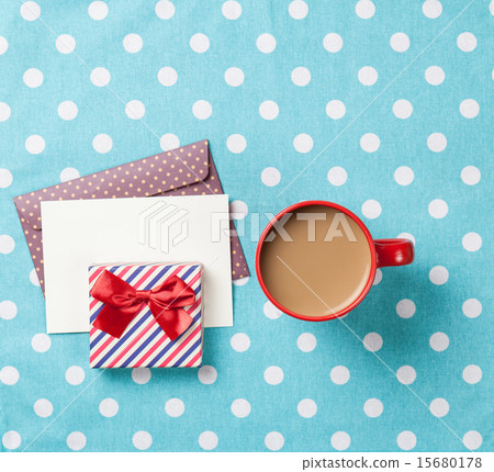 Cup of coffee and envelope 15680178