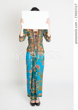 Asian girl holding placard covering face Asian girl holding placard covering face 15683327