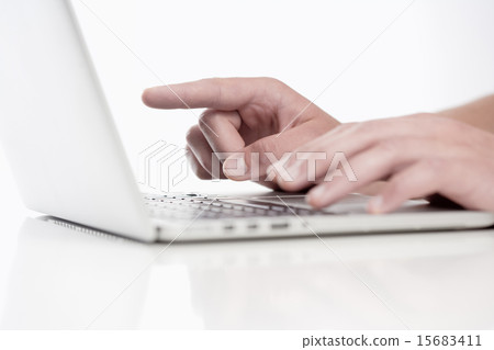 Closeup of Fingers Using Keyboard 15683411