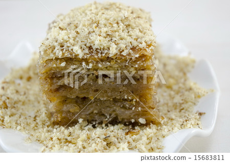 Baklava with grated walnuts on a plate 15683811