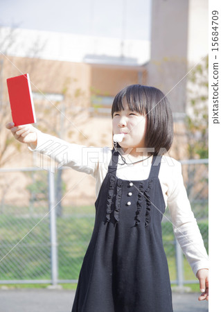 A girl with a red card 15684709