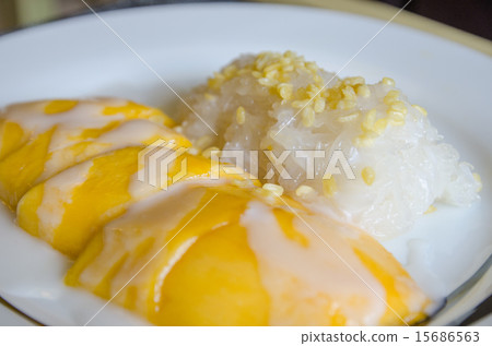 Sticky rice with mangoes with coconut milk on top Sticky rice with mangoes with coconut milk on top 15686563