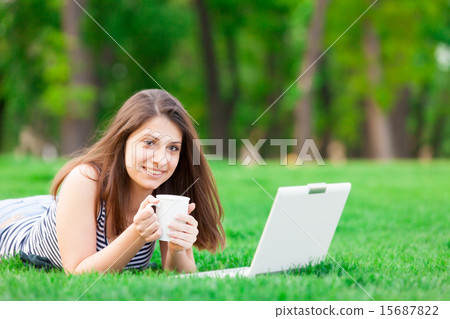 girl with laptop computer and cup girl with laptop computer and cup 15687822
