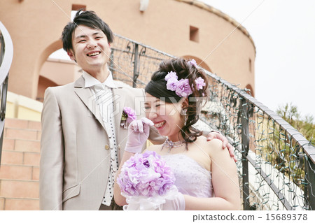 Staring bride and groom 15689378