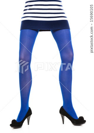 Woman long legs and blue stockings isolated Woman long legs and blue stockings isolated 15690105
