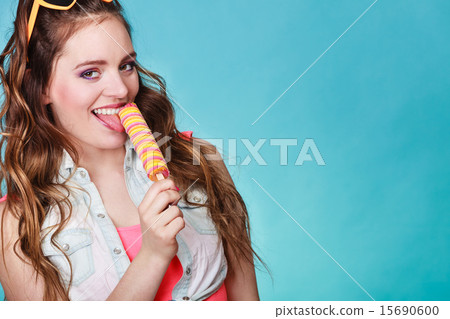Summer woman eating popsicle ice pop cream Summer woman eating popsicle ice pop cream 15690600