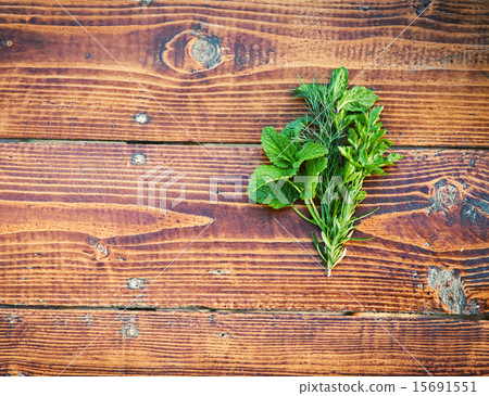Herbs on wooden table. Seasoning concept Herbs on wooden table. Seasoning concept 15691551