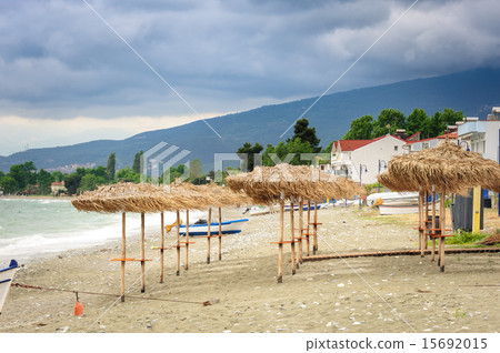 Reed umbrellas on the beach Reed umbrellas on the beach 15692015
