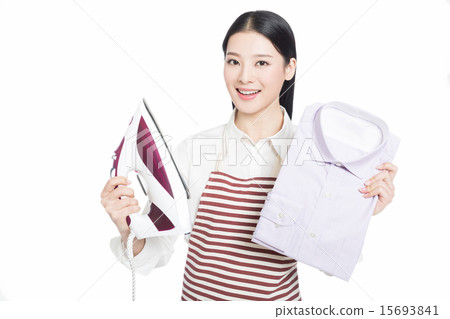 young housewife ironing 15693841