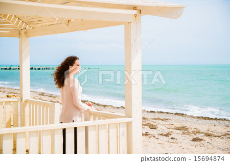 Girl at the sea in sunny weather Girl at the sea in sunny weather 15694874